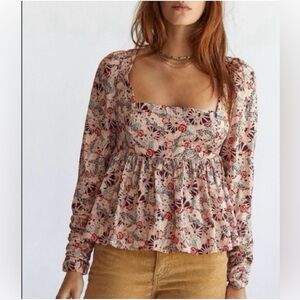 NWT Free People Santiago top blouse with a floral pattern and keyhole back.